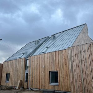 Mehrfamilienhaus Winkelfalzdeckung